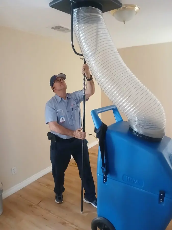 HVAC Installation technician using HEPA equipment in Draper